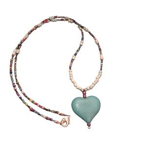 Beaded necklace with heart.